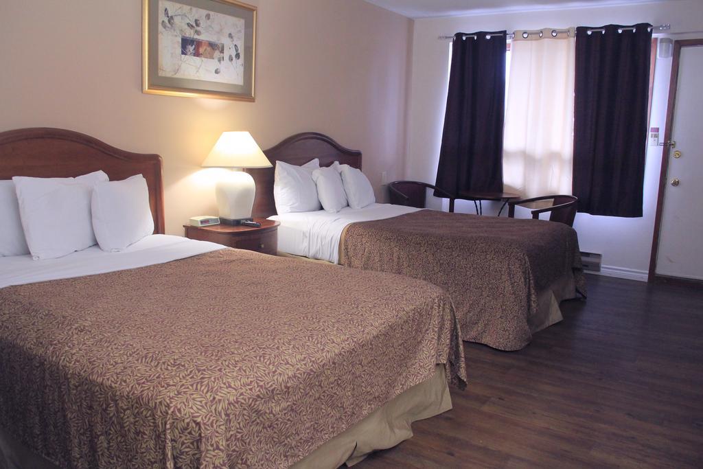 Joys Inn Niagara Falls Cataratas do Niágara Quarto foto